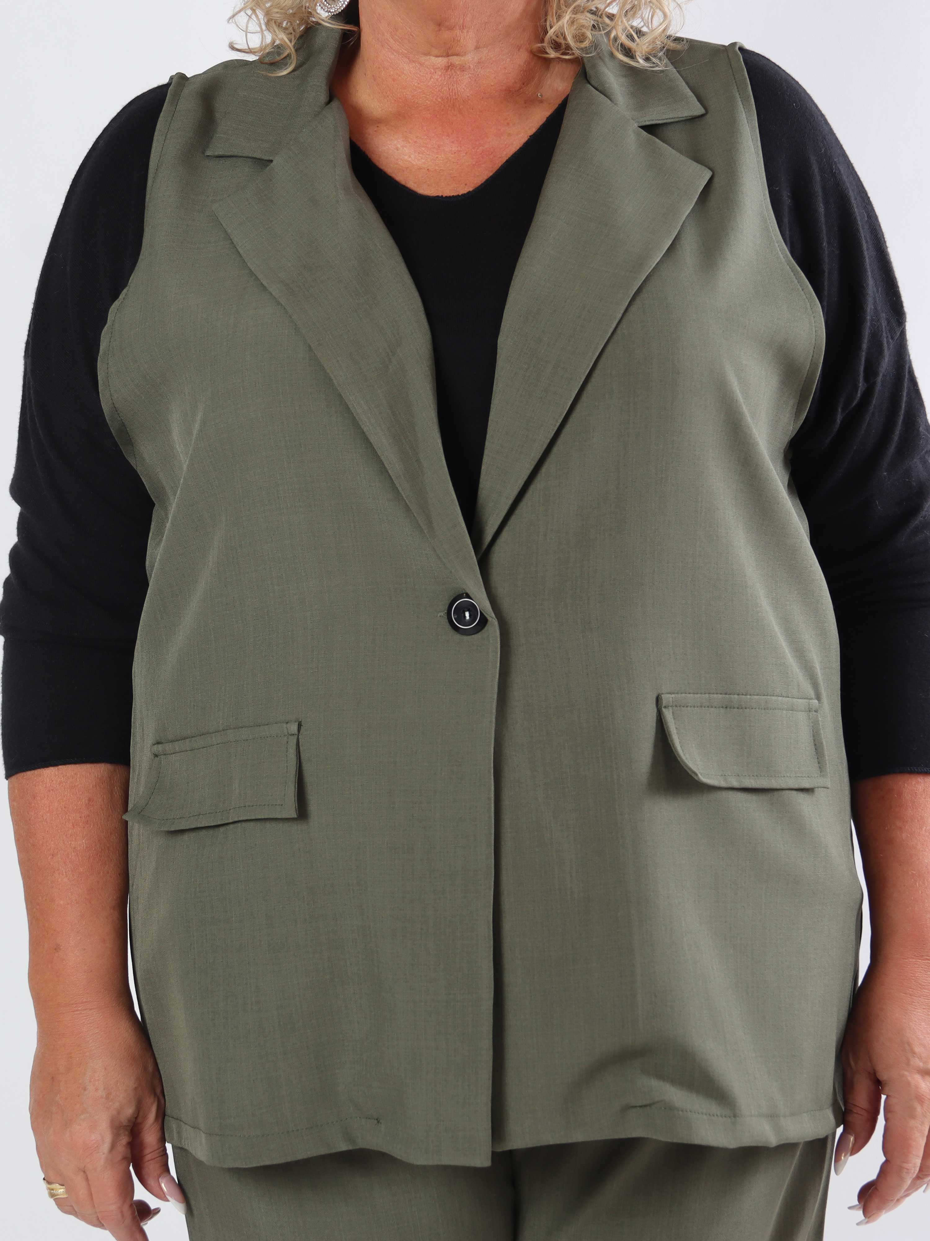 Shadia Vest - Enfärgad kostymväst med knapp och